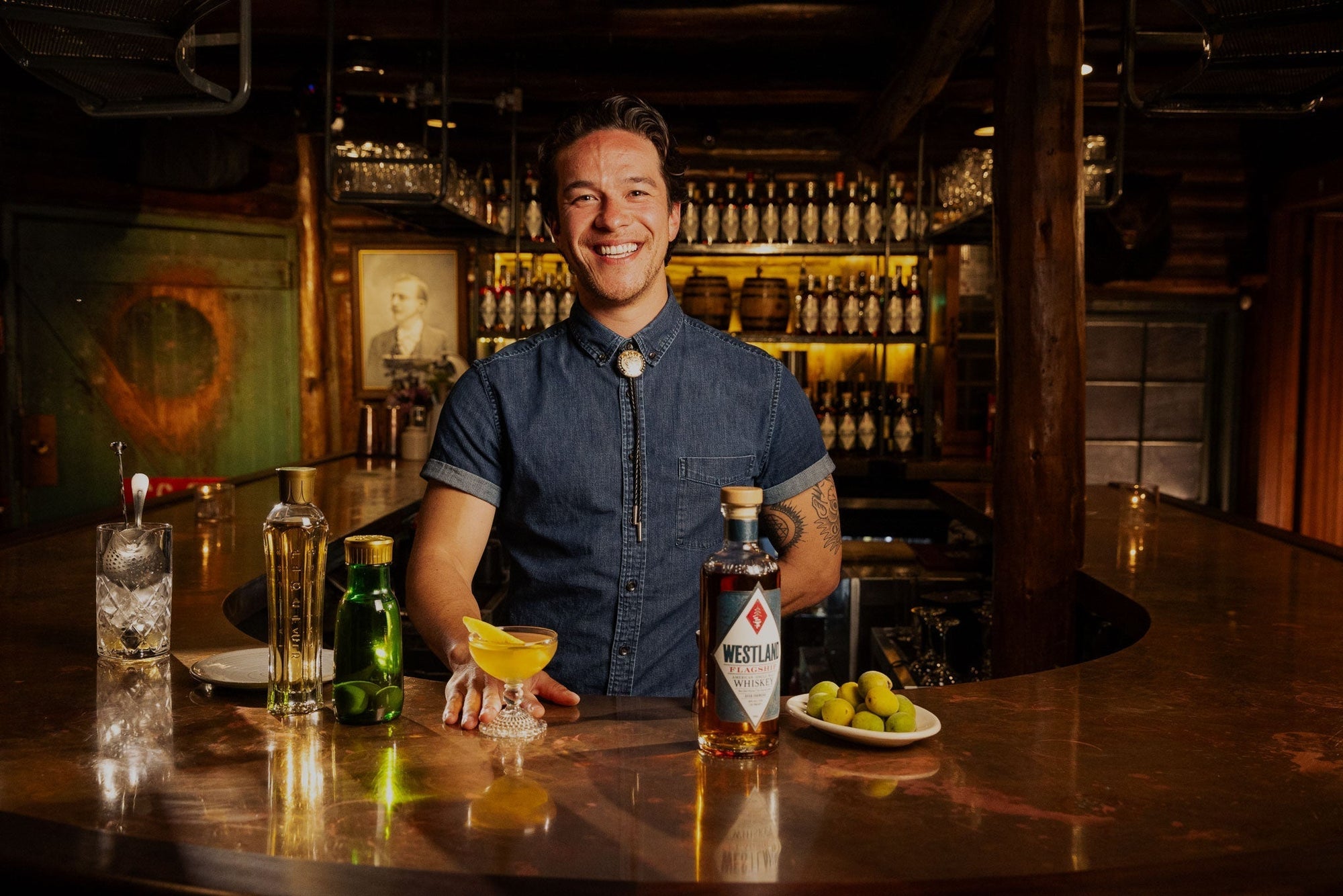 Man behind a cocktail bar